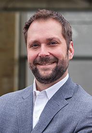 Justin Memenga headshot