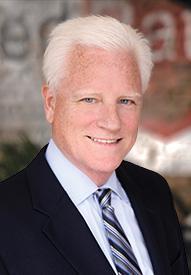 Tom Naughton headshot